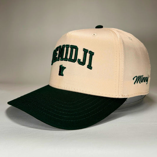 Side view of natural and green Bemidji 5-panel cap with puff lettering